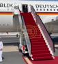 Main image for Scene as Qatar left the German president waiting at the door of his plane until a government official came welcome him.