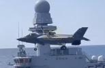 Main image for Italian Jet Executes Precision Vertical Landing on Carrier Landing.