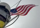FCC Chairman Brendan Carr Honors Tower Crews as US Flag Waves Proudly on 1800-Foot Tower