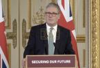 Main image for Starmer says, 'Coalition of the willing' will defend deal in Ukraine and guarantee peace