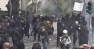 Main image for Protesters and police clash in Athens on deadly train crash anniversary