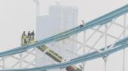 Main image for Emergency Services Save Man Climbing Railings in London's Tower Bridge.
