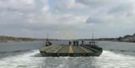 Main image for US Soldiers Construct Massive Land Bridge in Minutes