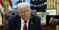 Main image for President Donald Trump announces tariffs on foreign cars in the Oval Office and answers questions about the Signal controversy.