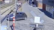 Main image for Close Call in Belgium: Two Flee Car Seconds Before Train Smashes Into It 