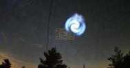 Main image for Stunning Sky Phenomenon by a Mysterious blue spiral spotted across Europe. 