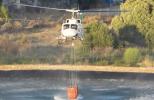 Main image for WATCH: Helicopter Successfully Fills a Bucket During a Low-Altitude Maneuver