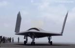 U.S. Navy's Mystery Drone Spotted on Carrier While Houthis is on Edge in Red Sea.