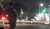 Main image for Police Search for More Suspects in Manhattan Victim's Fatal Shooting.