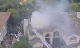 Main image for 2 Dead after Home Ablazes After Small Plane Crashes into Simi Valley Neighborhood.