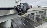 Main image for Semi-Truck Driver Dangling Off Bridge Rescued in Dramatic Operation After Louisville Crash.