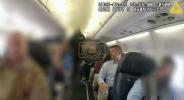 Main image for Bodycam Footage Shows Arrest of Passenger Who Brought Loaded Gun on Plane. 