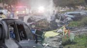 Main image for Small Plane Crashes Into San Diego Homes. 