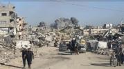 Main image for Footage Shows Gazans Fleeing Through Dust Cloud. 