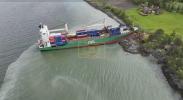 Man Wakes to Grounded Cargo Outside His Home. 
