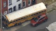 Main image for School Bus Crashes into Philadelphia Rowhome. 