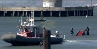 Main image for 9 Saved as Sailboat Sinks in San Francisco Bay. 