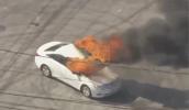 Main image for Car Engulfed in Flames During Anti-ICE Protest in Compton. 