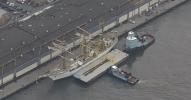 Main image for Mexican Navy Ship That Struck Brooklyn Bridge Towed for Repairs. 