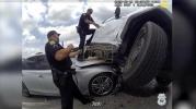 Main image for Police Rescue Father and Son from Car Teetering on Two Wheels After Crash in Tampa. 