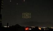 Main image for Ballistic missiles seen departing Iran for Israel.