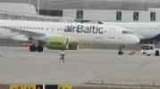 Man Sprints Across Tarmac Near Moving Plane. 