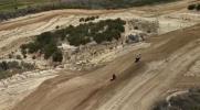 Main image for Thrilling Drone Footage Captures Motocross Bikers Soaring Through the Air. 