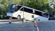 Main image for Bus Plunges Through Parking Garage Pavement in North New Hyde Park. 