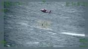 Main image for Heroic Coast Guard Rescue: Man Saved After Clinging to Bait Box Off Molokai. 