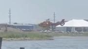Main image for Helicopter Flips, Crashes Outside Michigan Restaurant in Botched Landing Attempt. 