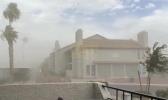 Main image for Dust Storm Sweeps Through Las Vegas, Palm Trees Bend in the Wind. 