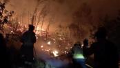 Main image for Wildfire Tears Through Spain's Catalonia, Burning 5,000 Acres as Crews Battle Fierce Winds. 