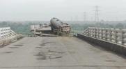 Main image for Bridge Collapse in India's Gujarat Kills at Least 9, Rescue Teams Search for Survivors. 