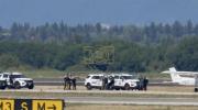Main image for Alleged Plane Thief Arrested at Gunpoint on Vancouver Airport Runway. 