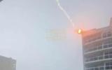 Main image for Lightning Strikes Apartment Roof in Jacksonville Caught on Video.
