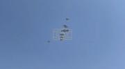 Main image for Plane Airdrops Aid Over Gaza City as Residents Cheer.