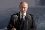 Main image for Putin Commissions New Nuclear Submarine, Vows to Bolster Russian Navy. 