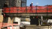 Main image for President Trump Visits Federal Reserve Construction Site, Embraces Builder Persona.