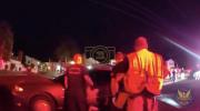 Main image for Watch: Police and Firefighters Heroically Lift Car Off Trapped Motorcyclist in Phoenix.