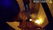 Main image for NYPD Officers Rescue Two from Burning Queens Home. 