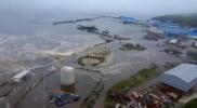 Main image for Tsunami Aftermath: Water Recedes in Severo-Kurilsk Following Massive Earthquake.