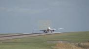 Main image for Planes Battle High Winds, Thousands Lose Power Across UK. 