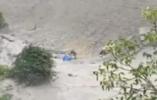 Main image for Survivor Crawls Through Mud After Flash Flood in Indian Village.