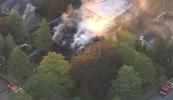Main image for Rabbi and Family Flee Raging Synagogue Fire. 