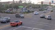 Main image for Car Blasts Through Red Light.
