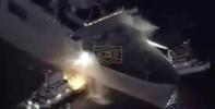 Main image for U.S. Navy Catches Fire Off Japan Coast.