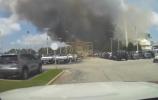 Main image for New Angle Through Dashcam Captures Clinic Explosion. 