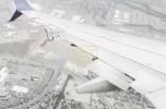 Main image for Delta Jet Lands Safely After Midair Wing Failure.