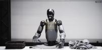 Main image for Robot Shocks World by Folding Laundry.