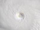 Main image for Lightning Flashes Inside Hurricane Erin's Eye.